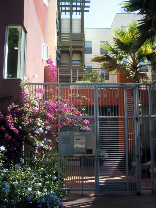 Entry courtyard metal gate at Columbia Park in San Francisco. 