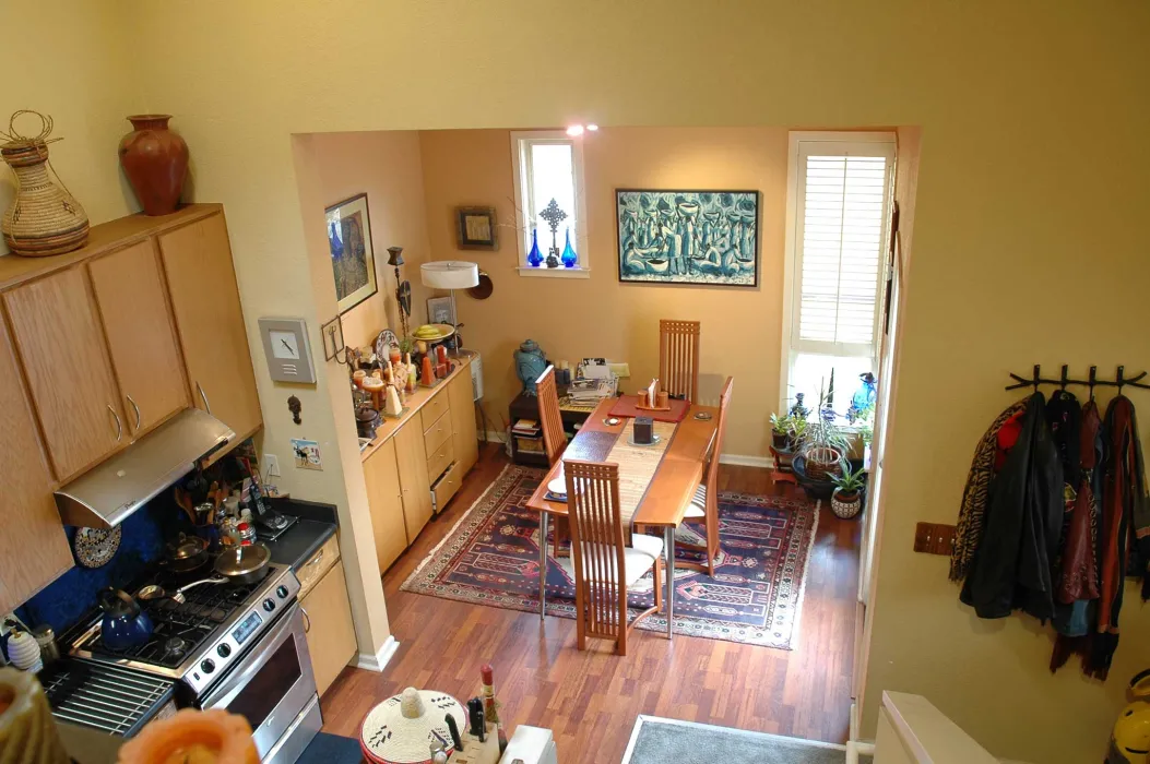 Interior view of a unit dining room and kitchen at Bell Mews in San Francisco. 