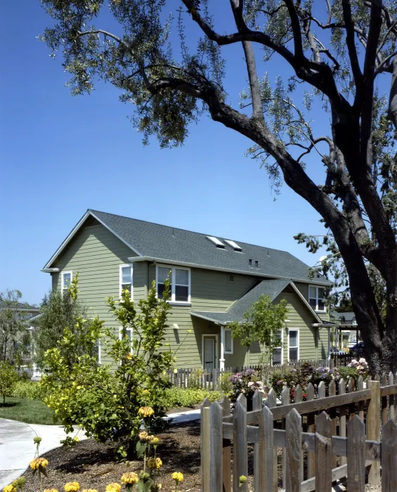 Townhouse beyond the community rose garden at Oroysom Village in Fremont, California.