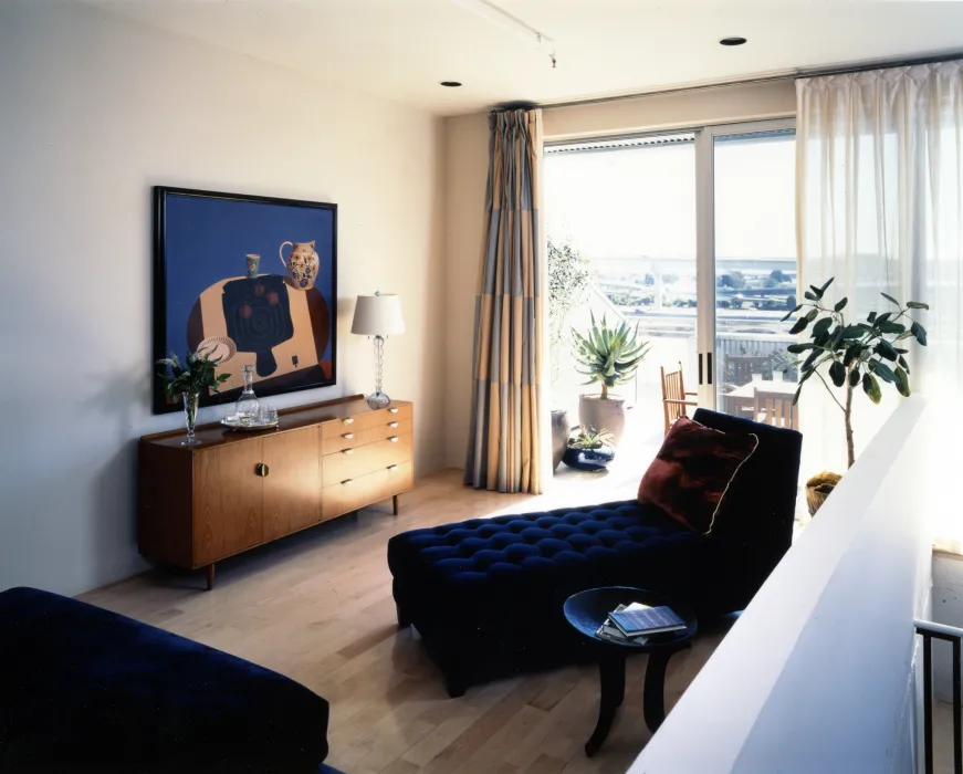 Interior view of a unit duplex loft living room at 1500 Park Avenue Lofts in Emeryville, California.