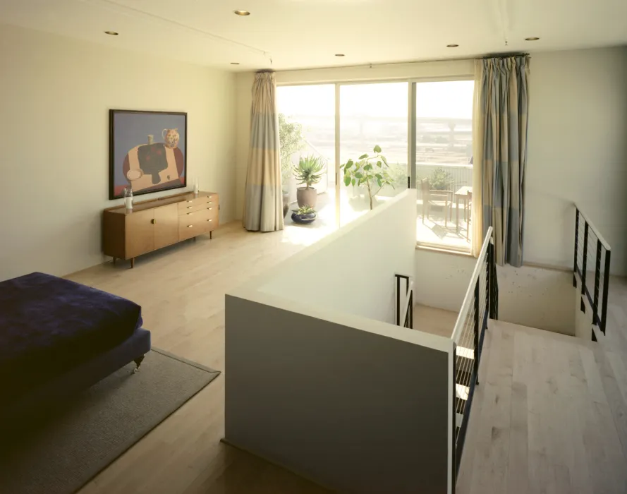 Interior view of an upstairs loft unit at 1500 Park Avenue Lofts in Emeryville, California.