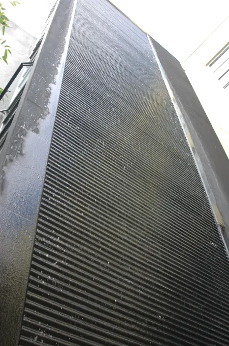 Detail view of the fountain wall at 1500 Park Avenue Lofts in Emeryville, California.