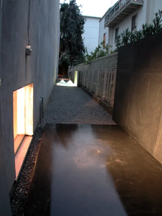 Exterior installation with glass mountains in background at 310 Waverly Residence in Palo Alto, California.