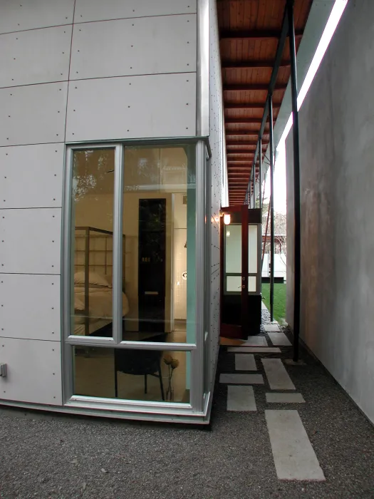 Looking through the window into the master bedroom at 310 Waverly Residence in Palo Alto, California.