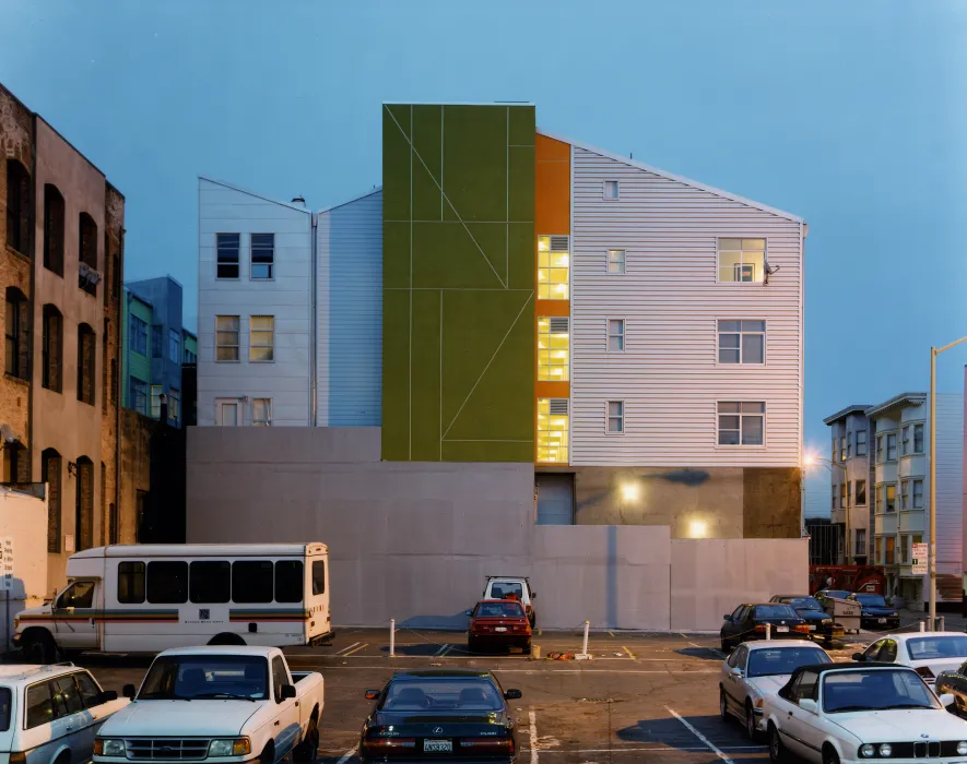 Exterior view of SOMA Residences in San Francisco at dusk.