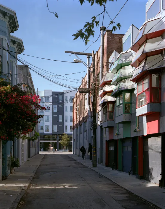 View from an alley with 8th & Howard/SOMA Studios in San Francisco, Ca in the background.