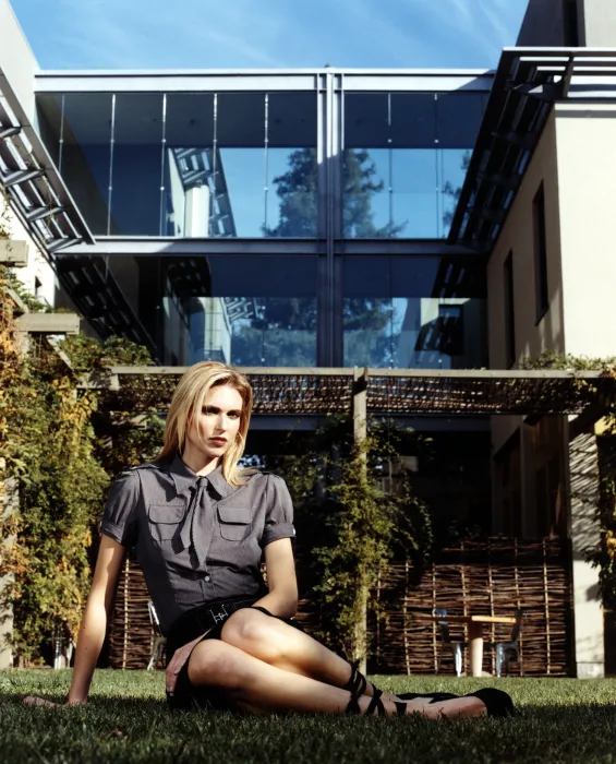 Woman sitting in the courtyard at Hotel Healdsburg in Healdsburg, Ca.