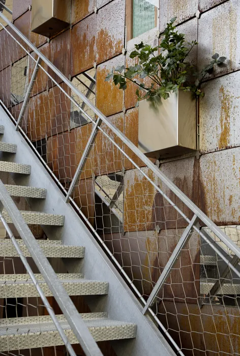 Close view of the outdoor metal stairs at Zero Cottage in San Francisco.