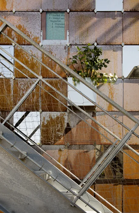 Close view of the outdoor metal stairs at Zero Cottage in San Francisco.