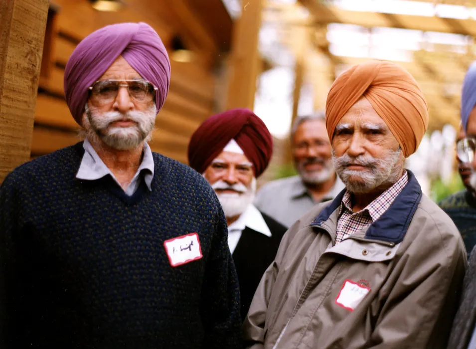 four men standing at Northside Community Center in San Jose, California.