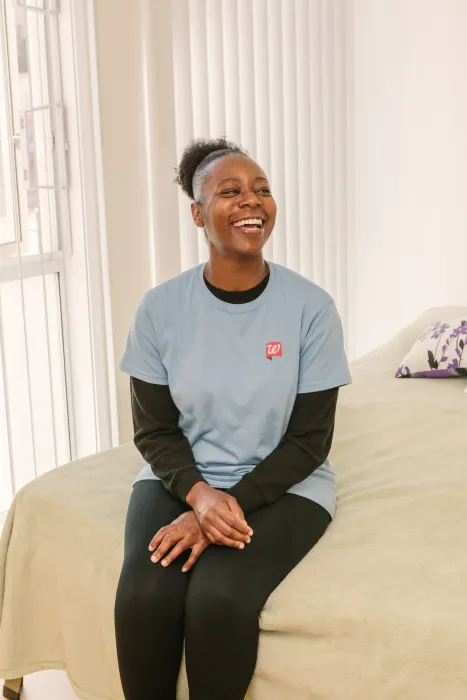 Resident sitting in her room at Bayview Hill Gardens in San Francisco, Ca.