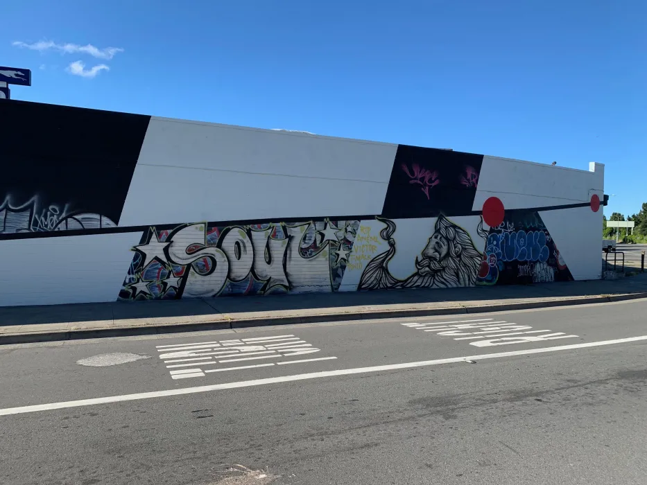 Street art beginning to appear on the side of David Baker Architects in Oakland, California.