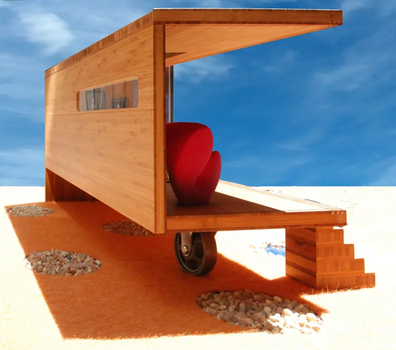 View of the underneath of Modularean Eco House, with its wheel making it mobile.