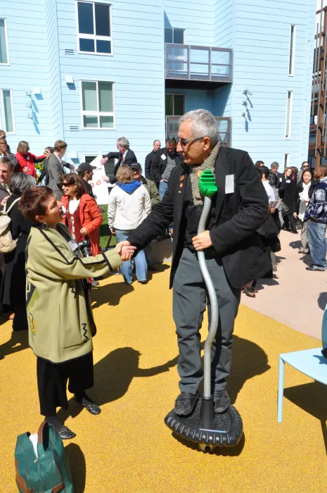 David Baker shaking hands with Cynthia Parker at the grand opening of Ironhorse at Central Station in Oakland, California.