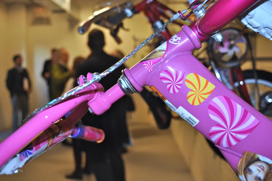 Pink bike with hearts inside the bike room at Armstrong Place Senior in San Francisco.