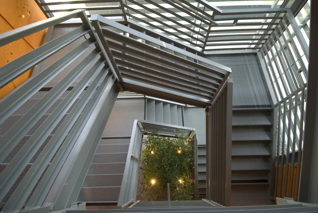 Looking down into the open-air stairs at 888 Seventh Street in San Francisco.