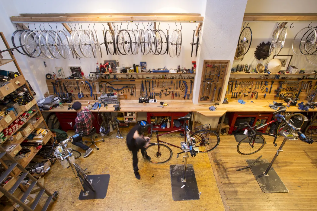 Interior view of the bicycle repair center inside Huckleberry Bicycles in San Francisco.