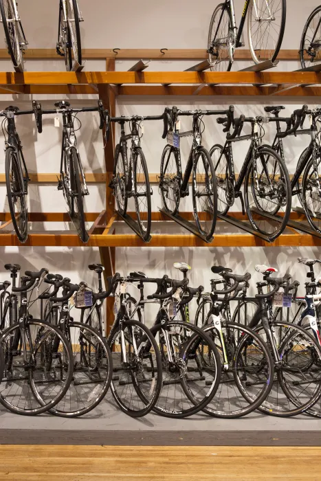 Detail view of hanging bicycles inside Huckleberry Bicycles in San Francisco.