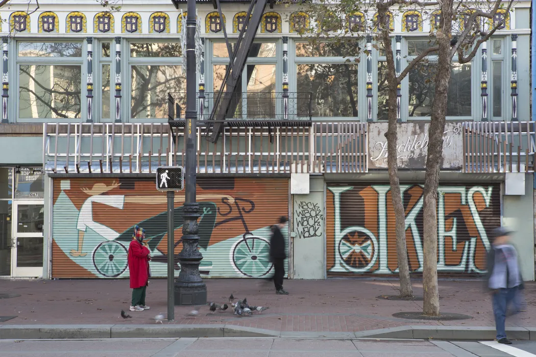 Exterior street view of the mural on the outside of Huckleberry Bicycles in San Francisco.