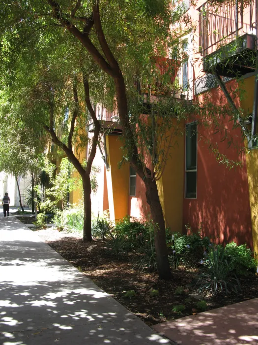 Sidewalk view with Pensione K on the right in Sacramento, California.