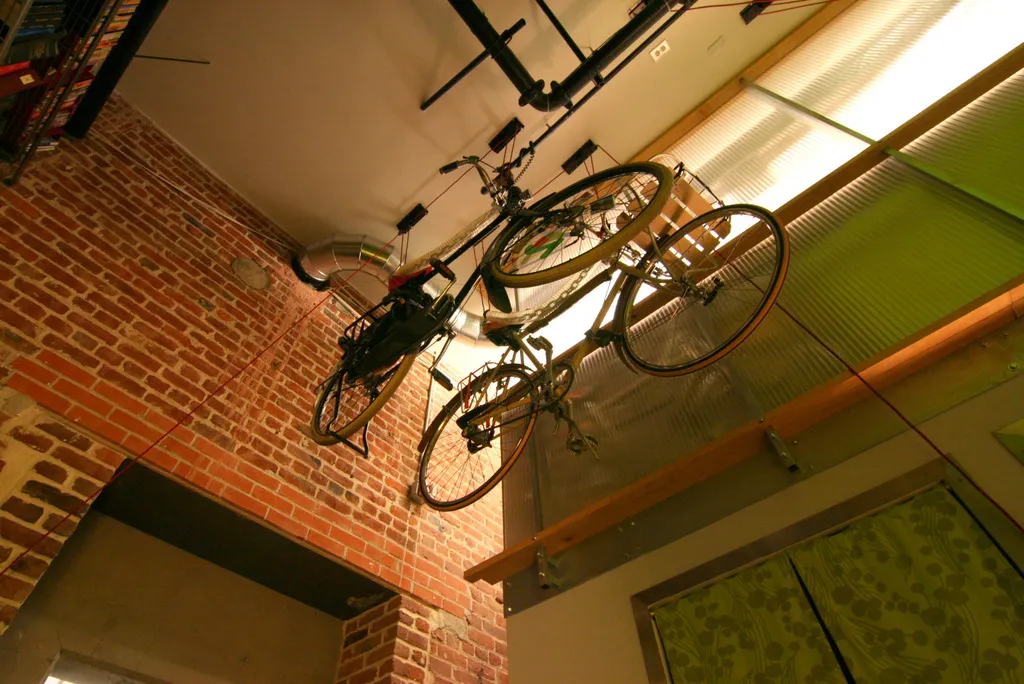 Bicycles hanging from the ceiling of David Baker Architects Office in San Francisco.