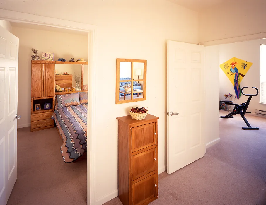 Interior view of unit bedroom and living room at Moonridge Village in Santa Cruz, California.