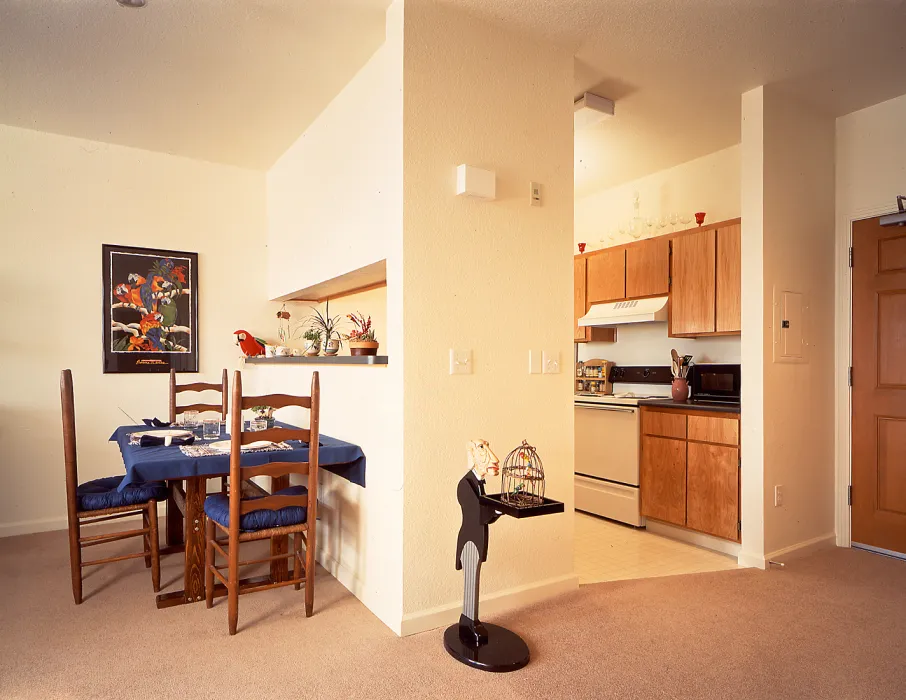 Interior of a unit kitchen and dining room at Moonridge Village in Santa Cruz, California.