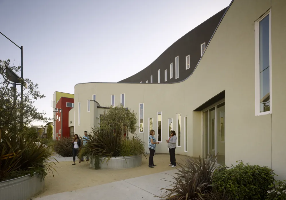 Entry plaza to apartment building at Tassafaronga Village in East Oakland, CA. 