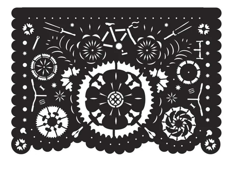 Papel picado whiich is tissue paper banners with intricate designs.