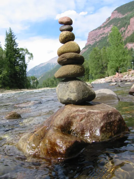 Rocks stacked up in a river near Redstone Cabin in Redstone Colorado.