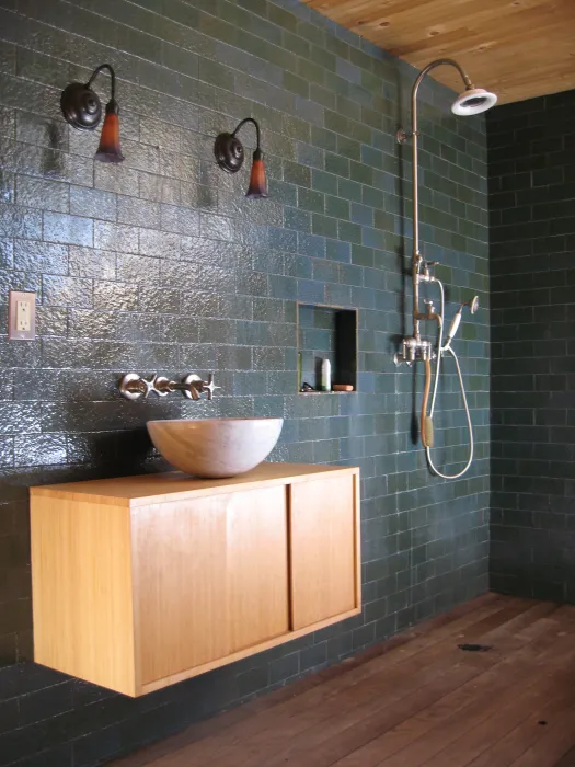 Open concept shower and bathroom sink at Redstone Cabin in Redstone Colorado.