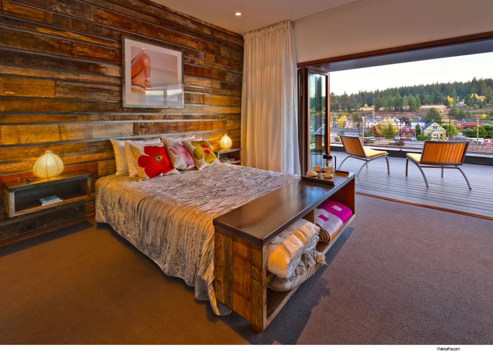 Interior view of a bedroom at Truckee Prototype Mixed-Use Townhouse in Truckee, California.