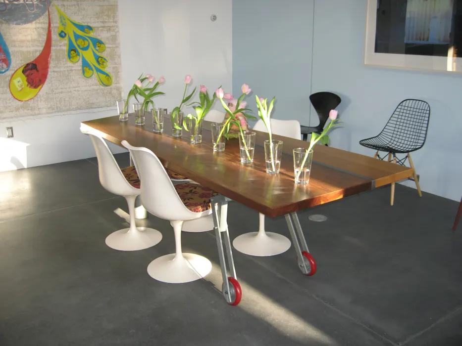Large dining room table with flowers at  Shotwell Design Lab in San Francisco.