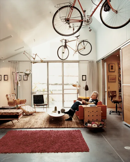 Man sitting on the couch in the living room at Shotwell Design Lab in San Francisco.