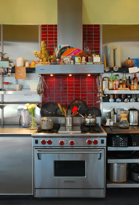 Kitchen stove and hood at Shotwell Design Lab in San Francisco.