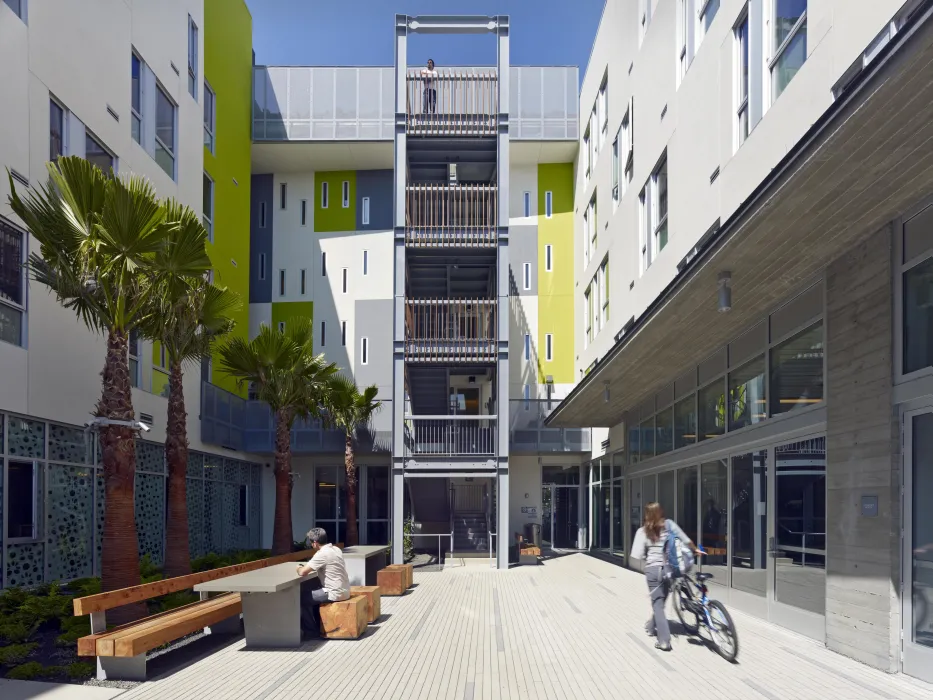 View of the courtyard facing open-air stair tower at Richardson Apartments in San Francisco.