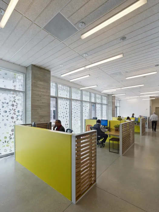 On-site clinic, with staff at work stations inside Richardson Apartments in San Francisco.