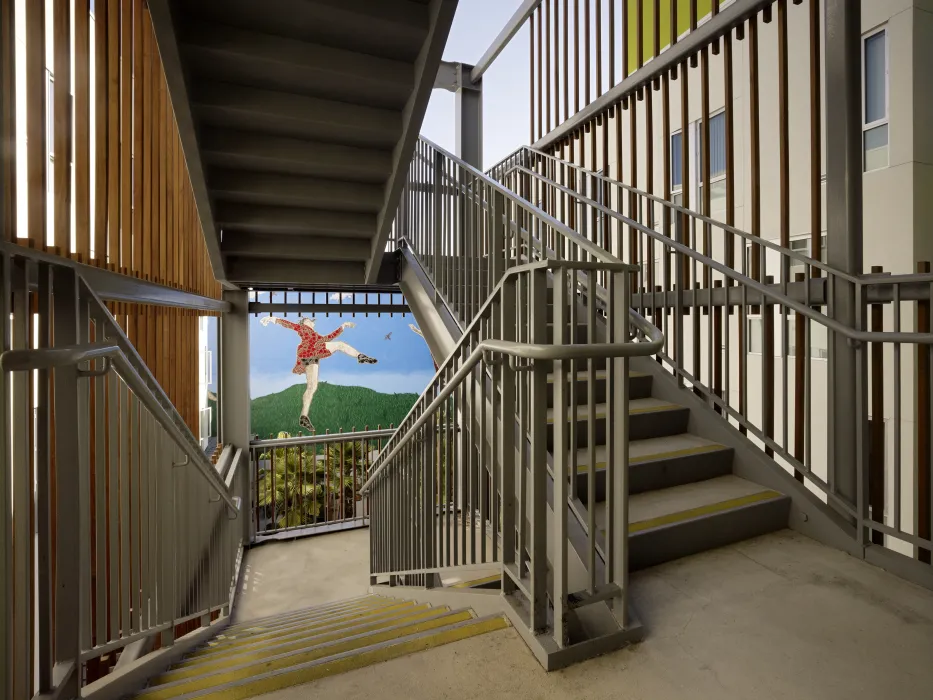 View on landing of open-air stair into the courtyard at Richardson Apartments in San Francisco.