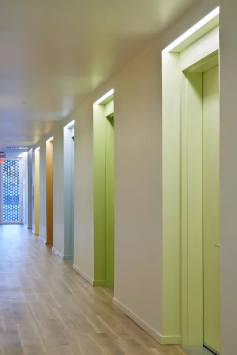 Residential hallway inside Tahanan Supportive Housing in San Francisco.