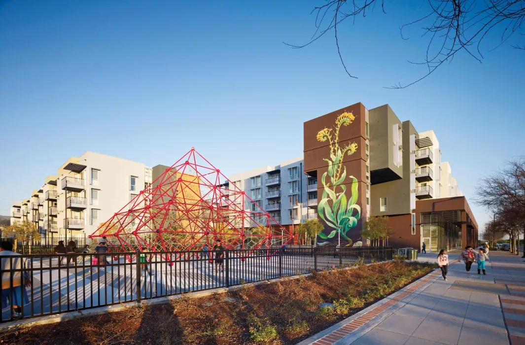 Exterior of playground and Station Center Housing in Union City