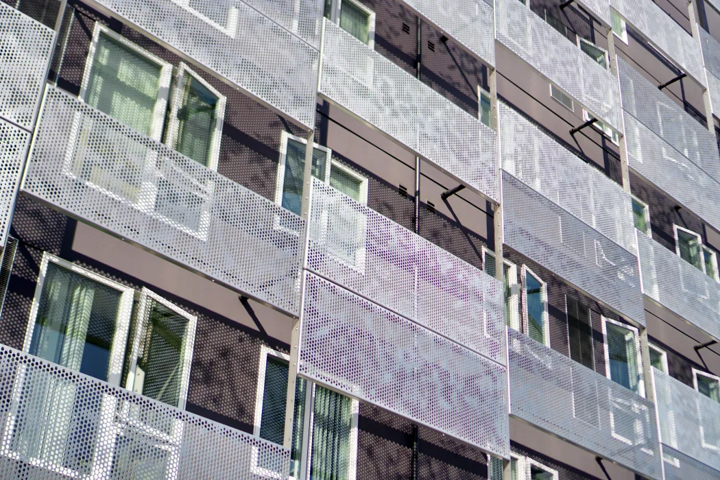 Exterior detail view of the façade at Coliseum Place in Oakland, California.