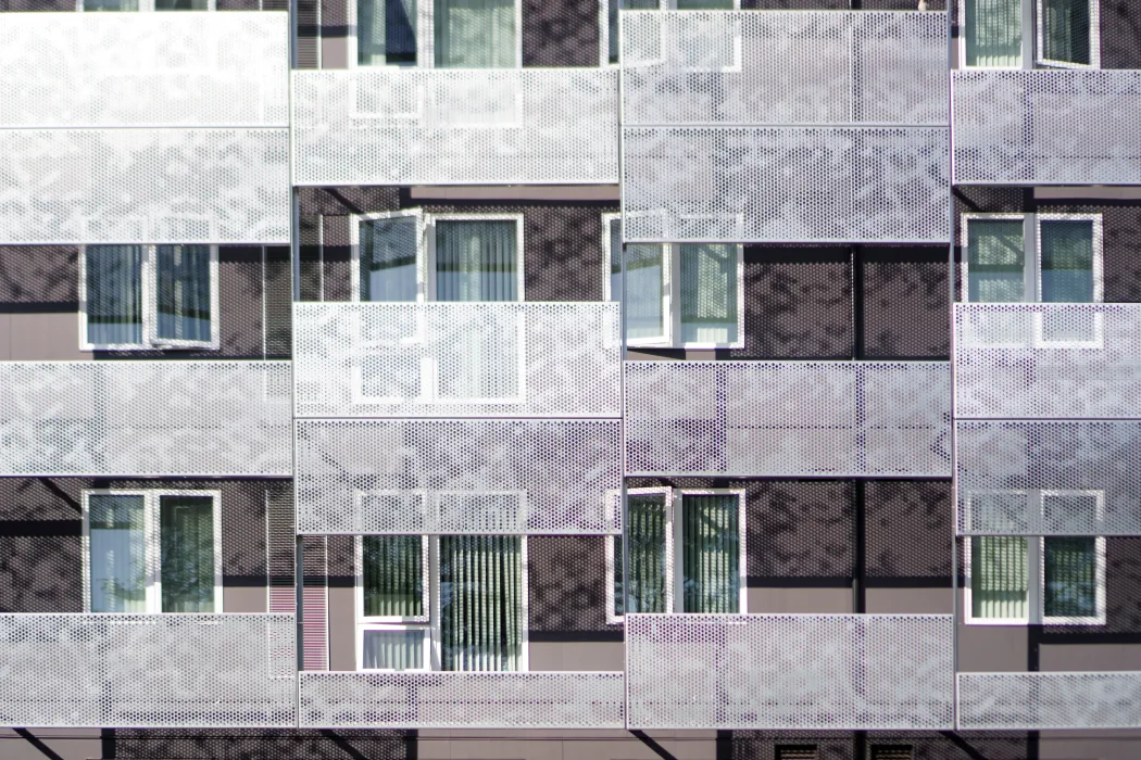 Exterior detail view of the façade at Coliseum Place in Oakland, California.