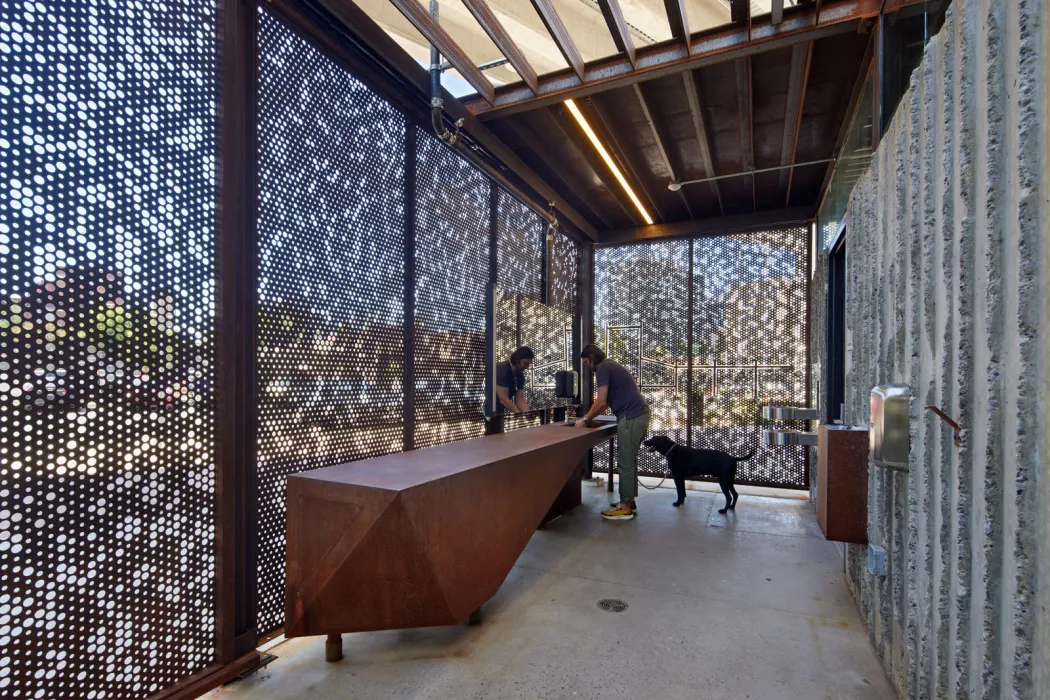 View of one of the bathrooms with a man washing his hands at City Walk in Birmingham, Alabama.