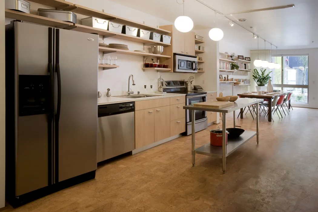 Interior view of a loft unit kitchen at Pacific Cannery Lofts in Oakland, California.