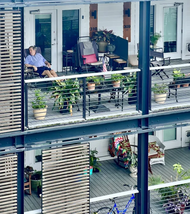 View of porches with various personal touches added by residents