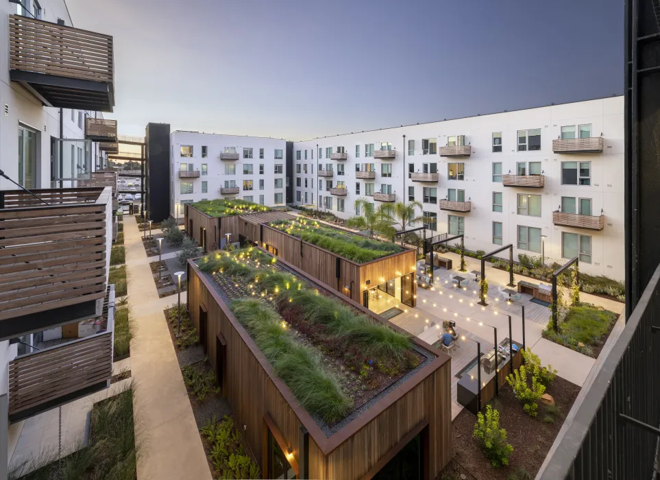 Exterior view of the Union Flats courtyard at dusk in Union City, California.