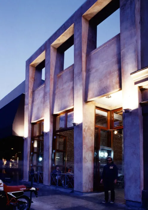 Exterior view of Cafe Milano at dusk in Berkeley, California.
