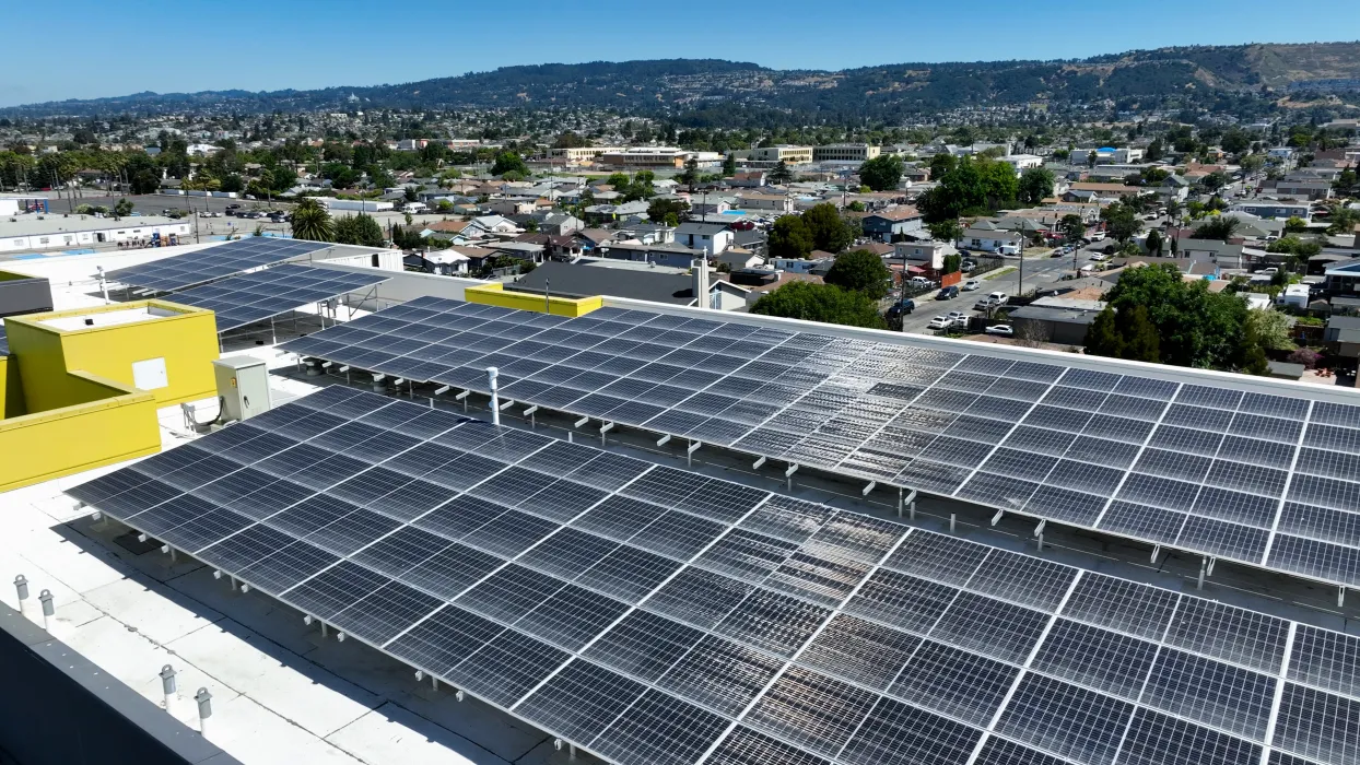 Close up of the solar panels on top of Coliseum Place in Oakland, California.