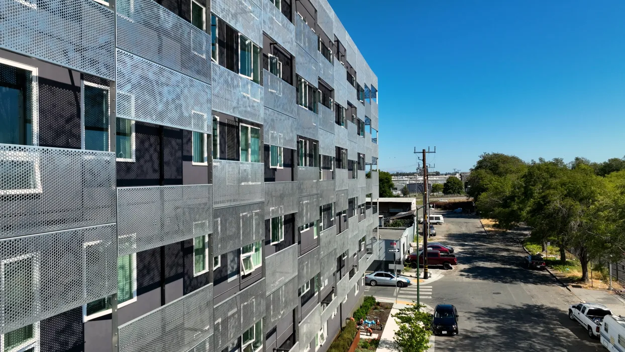 Close up of aluminum sun shades at Coliseum Place in Oakland, California.