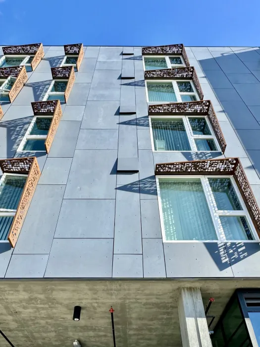 Exterior view of the Sango Court facade and sunshades.